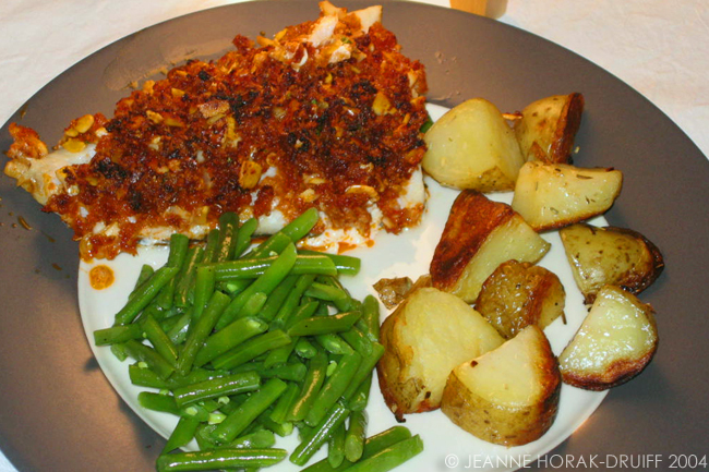 Red pesto-crusted fish with green beans and potatoes