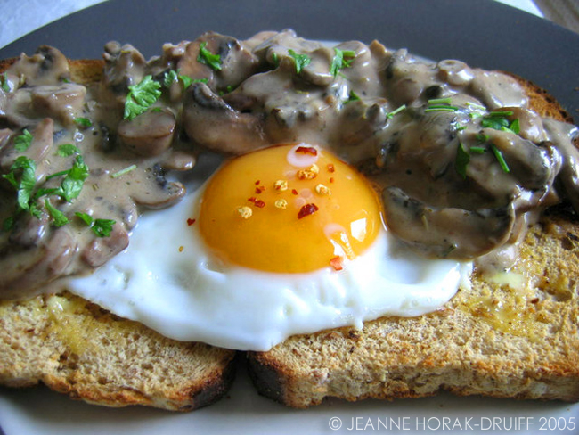 Creamy mushrooms on toast with fried egg