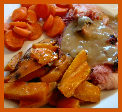 Plat of roast gammon and vegetables