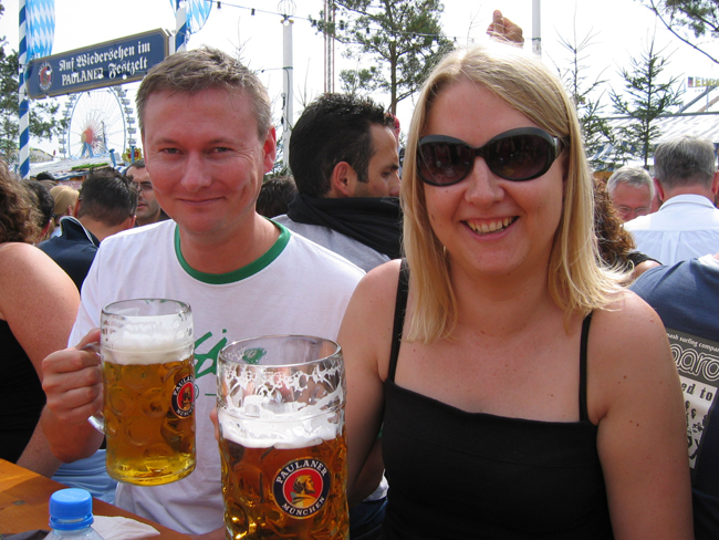 Couple drinking beer at Munich Oktoberfest 