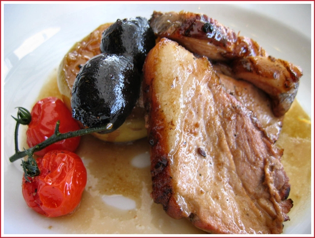 Pork chop with black pudding and tomato