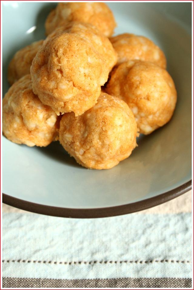 Olives wrapped in cheese pastry in a bowl