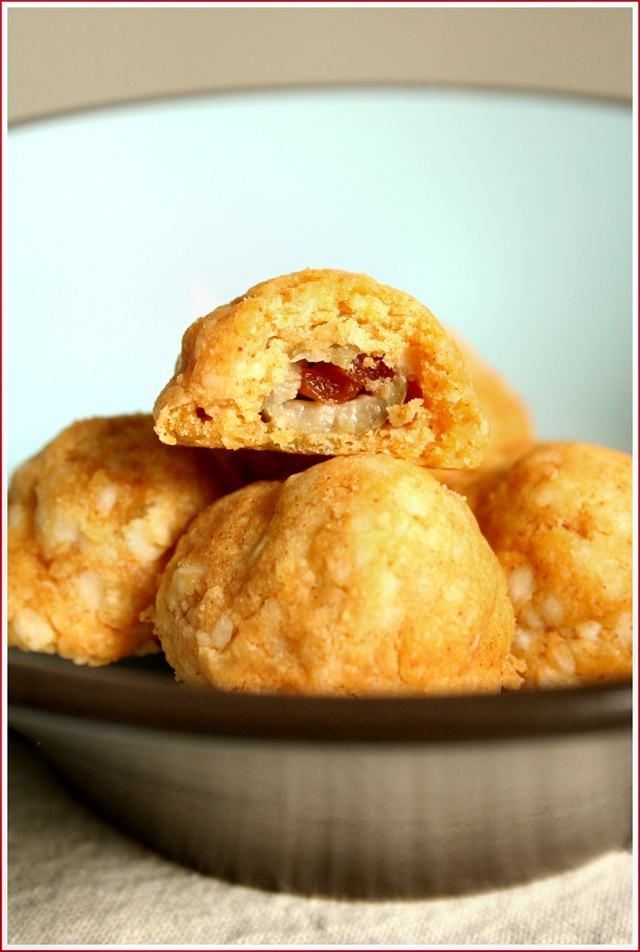 Olives wrapped in cheese pastry in a bow