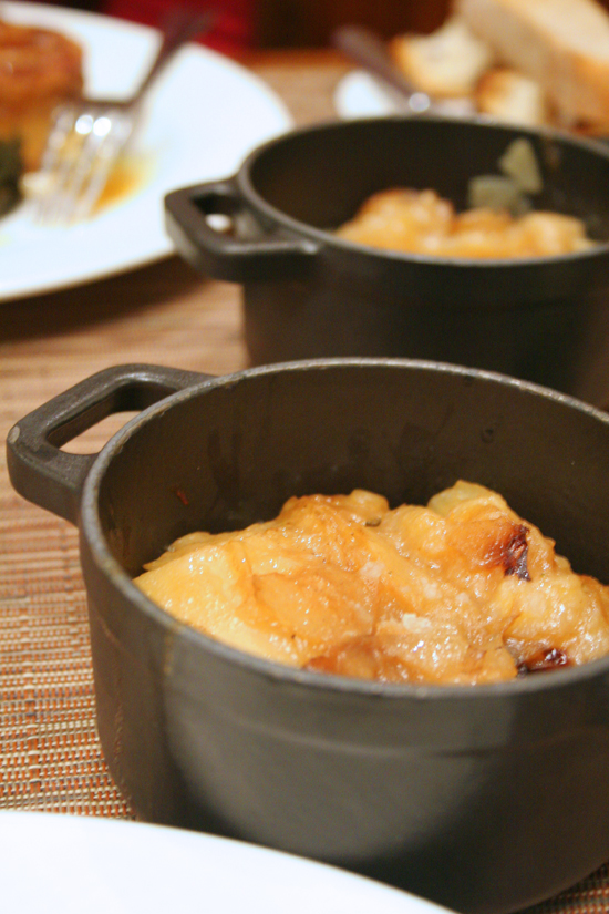 Boulangere potatoes in black cocotte dish