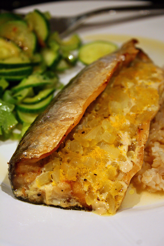 Whole mackerel filled with orange butter