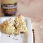 Warm potato salad with red onion, dill and wholegrain mustard
