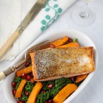 Pan-fried salmon on kale, sweet potato and pomegranate