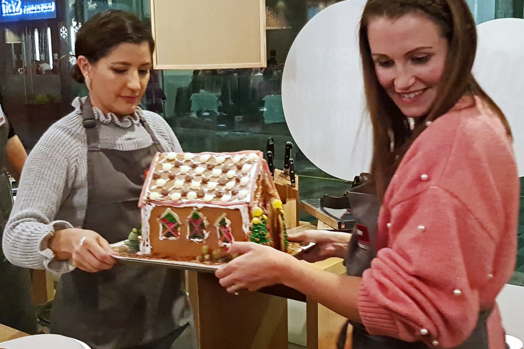 NEFF-gingerbread-house-bakeoff-carrying 