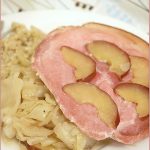 Gammon steaks on cabbage, apple and onions